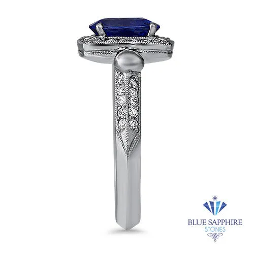 1.56ct Oval Blue Sapphire Ring with Diamond Halo in Platinum