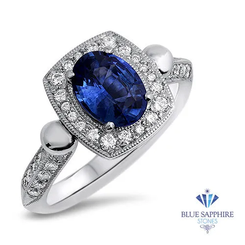 1.56ct Oval Blue Sapphire Ring with Diamond Halo in Platinum