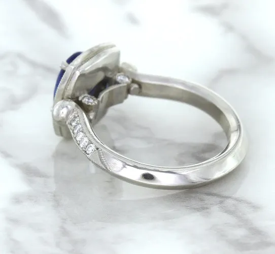 1.56ct Oval Blue Sapphire Ring with Diamond Halo in Platinum