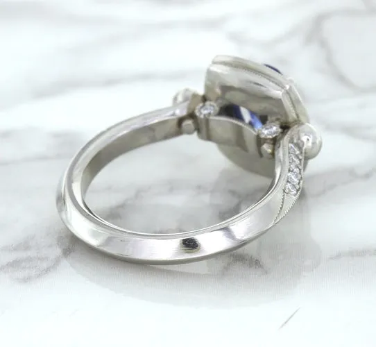 1.56ct Oval Blue Sapphire Ring with Diamond Halo in Platinum
