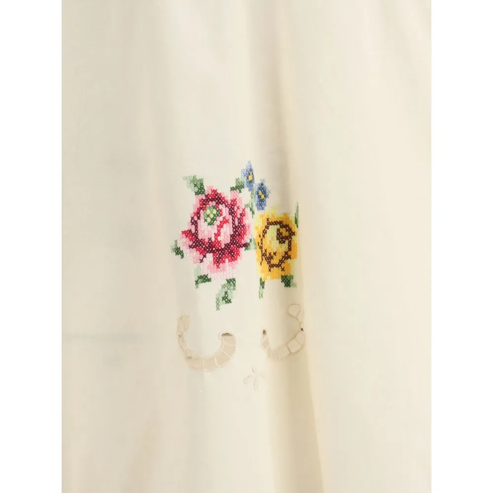 Blouse with floral details