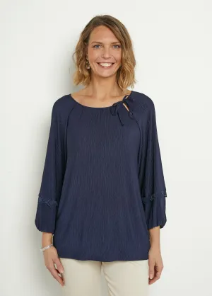 Flowing tunic, round neck with ties