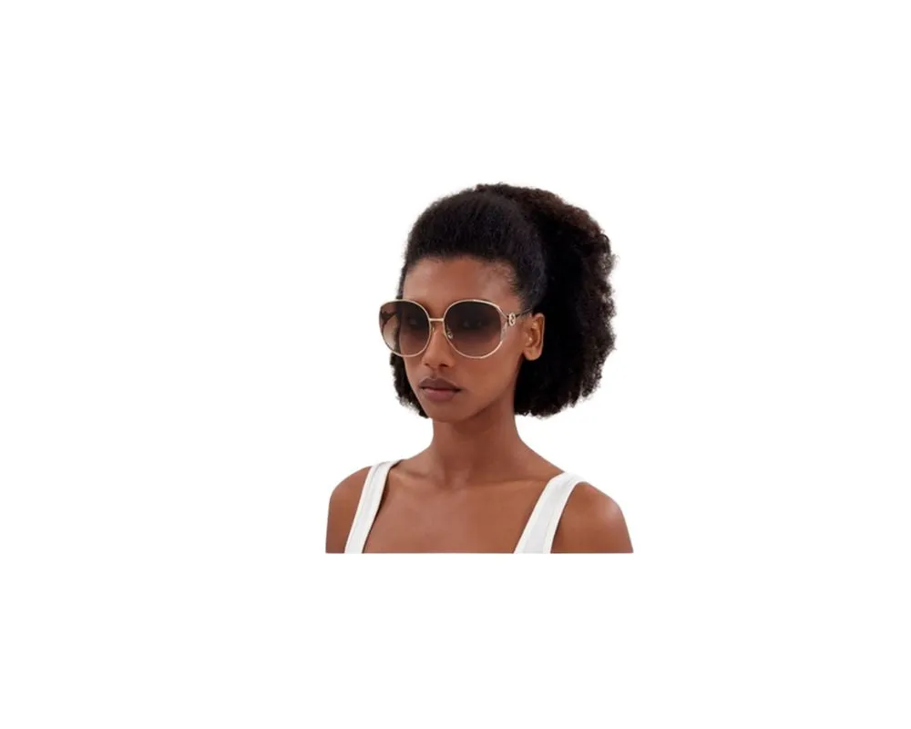 Gucci GG0225S 007 Sunglasses: Step Into Luxury